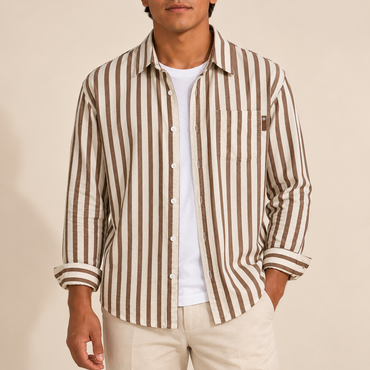 Model wearing a brown and cream striped long-sleeve shirt