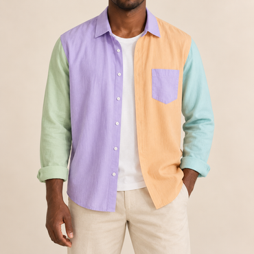 Model wearing a pastel colorblock long-sleeve shirt with a lavender chest pocket