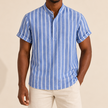 Model wearing a blue band-collar short-sleeve shirt with narrow white stripes
