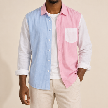 Model wearing a pink and pale blue long-sleeve colorblock shirt with a white chest pocket