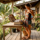 Woman packing lightweight beach clothes