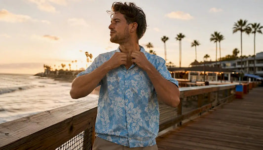 Man wearing Dan Flashes Hawaiian shirt on beach boardwalk