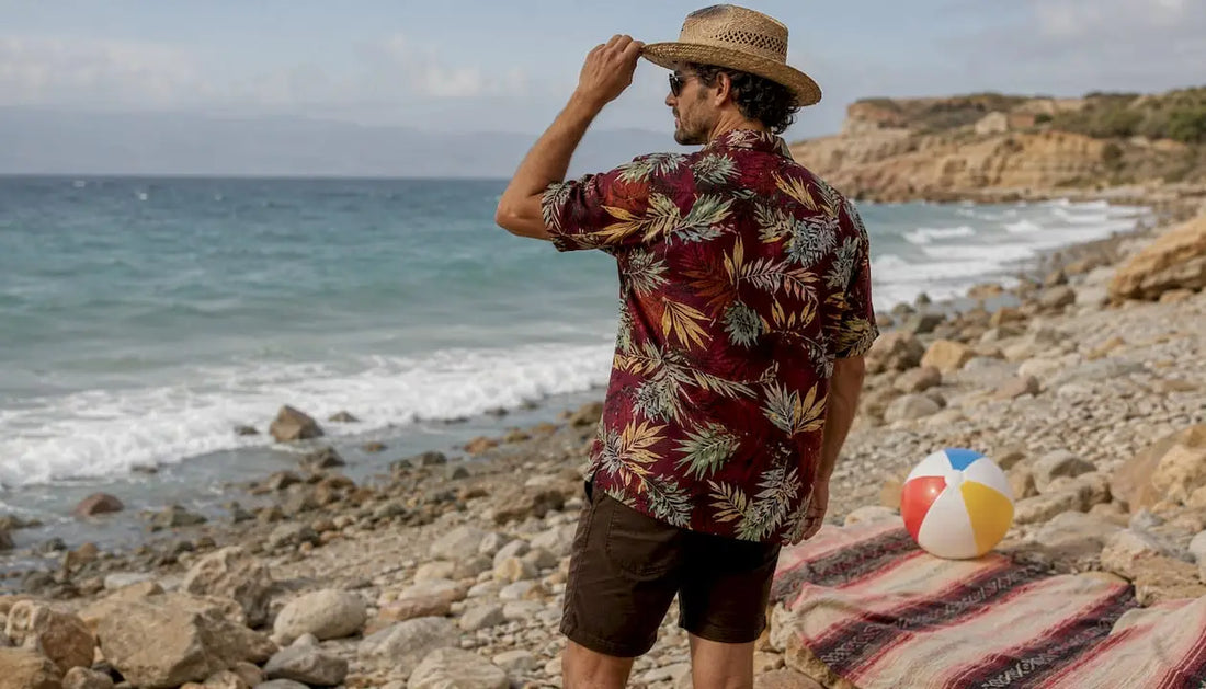 Man wearing Dan Flashes bold floral beach shirt