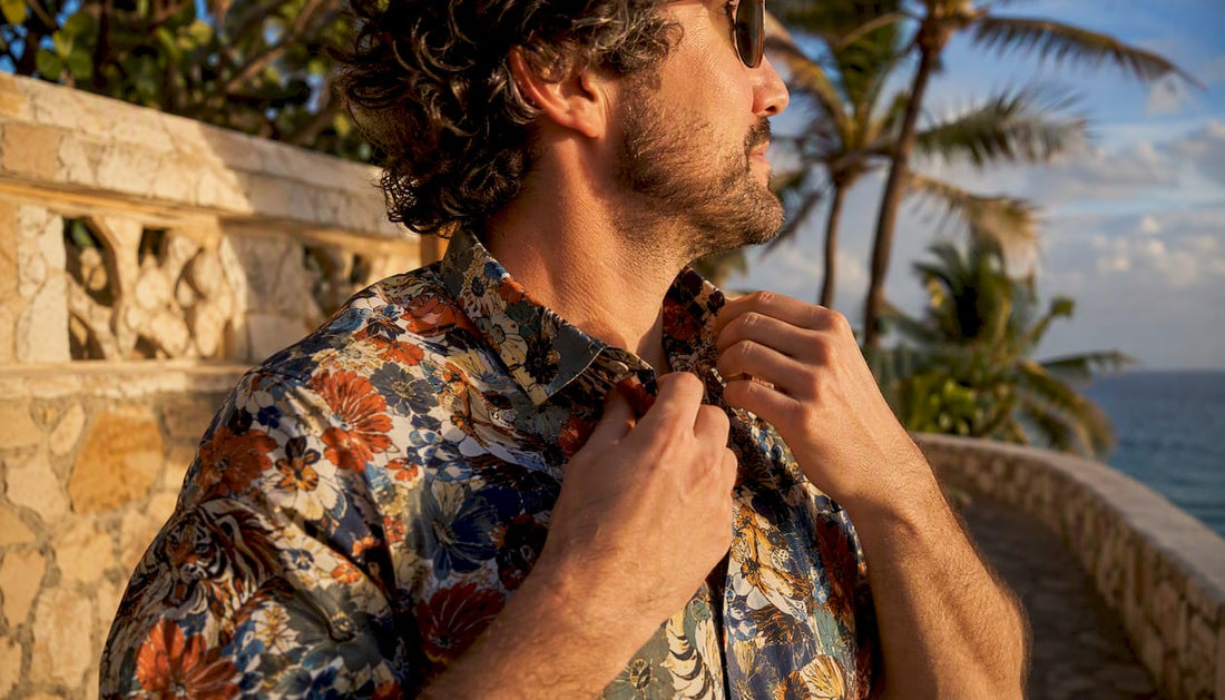 Man adjusting Danflashes Hawaiian shirt collar