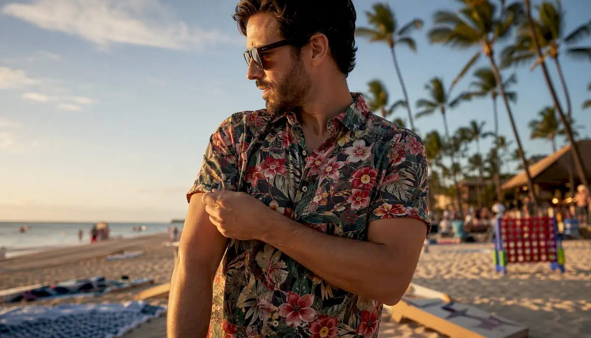 Man adjusting sleeve of organic cotton shirt