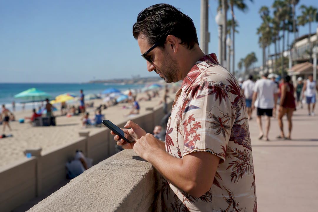 Man checking discount calculations on smartphone