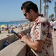 Man checking discount calculations on smartphone