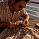Man inspecting certified shirt construction