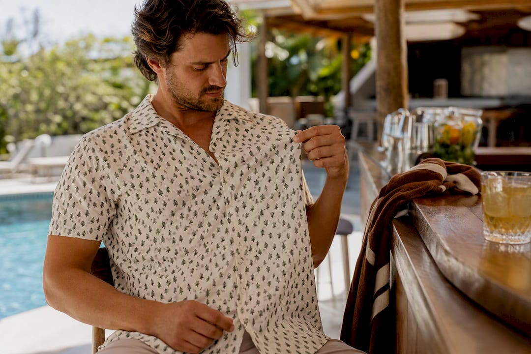 Man inspecting a bamboo shirt after wear
