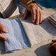 Seersucker and linen fabric swatches compared