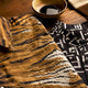 Close-up of bold patterned shirt fabrics