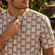Man wearing a Dan Flashes band collar shirt