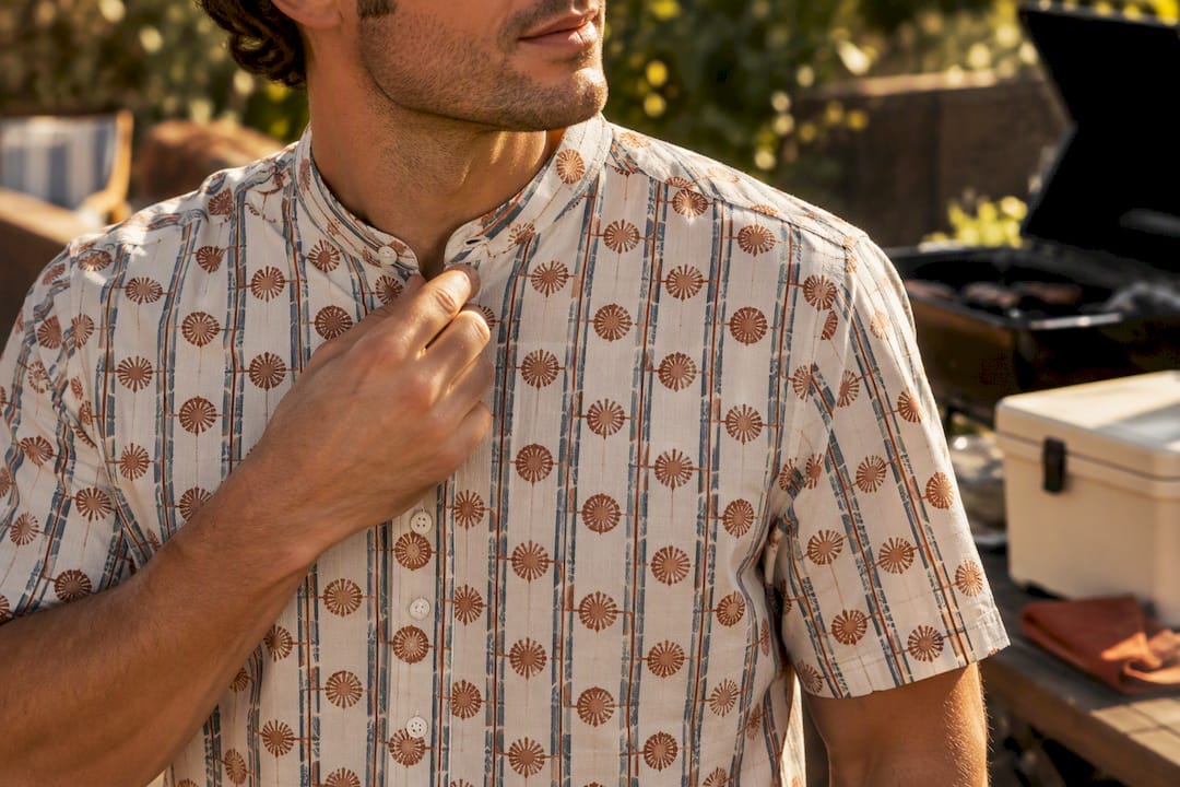 Man wearing a Dan Flashes band collar shirt