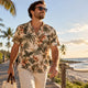 Man wearing verified tropical button down shirt