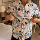 Man measuring chest of Dan Flashes shirt