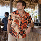 Man wearing a Dan Flashes shirt at a tiki bar