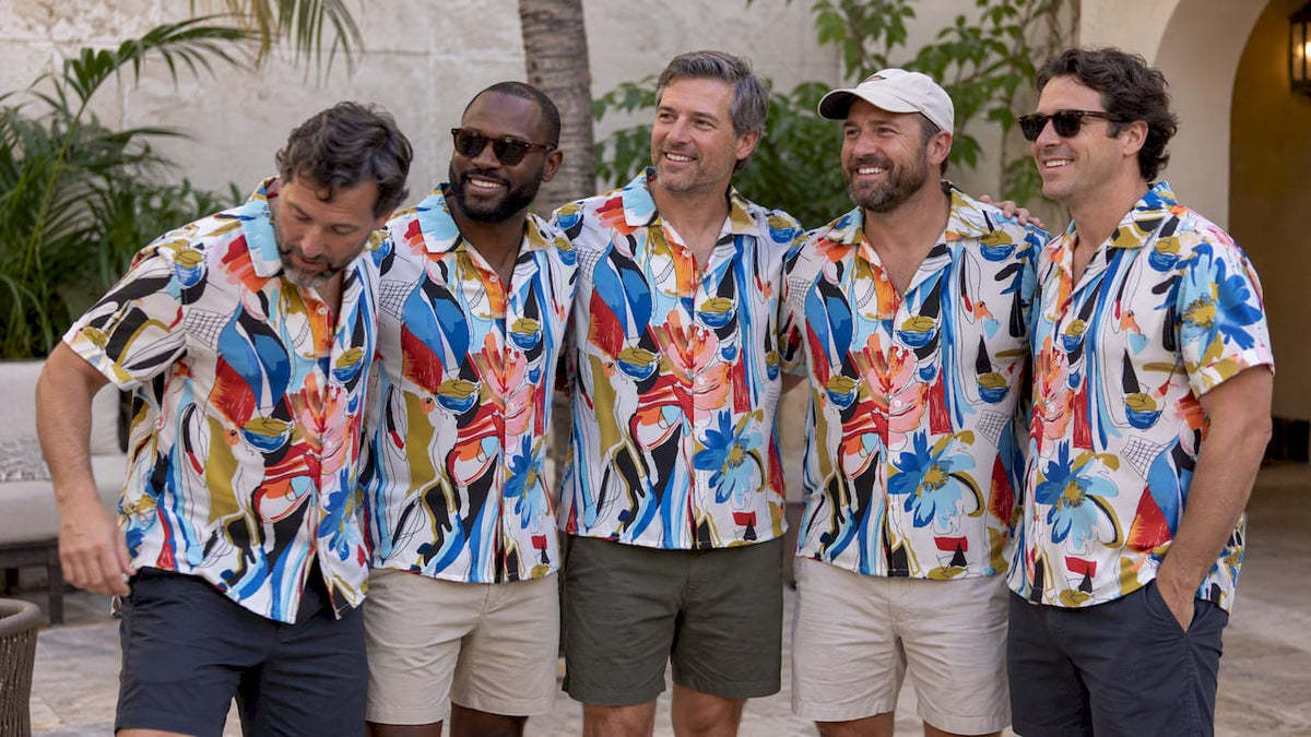 Adult men wearing coordinated Dan Flashes shirts