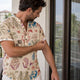 Man checking where his short sleeve ends