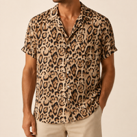 Man wearing an animal print short sleeve shirt - Dan Flashes