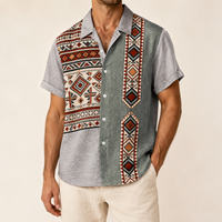 Man wearing a grey and orange Aztec panel shirt - Dan Flashes