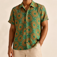 Man wearing a green patterned shirt from the multi-buy collection - Dan Flashes