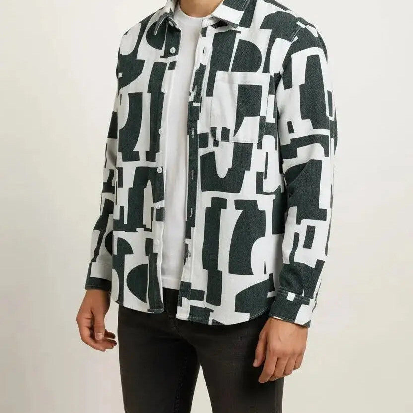 Man wearing a black and white geometric long-sleeve shirt