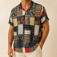 Man wearing a multicolor paisley short sleeve shirt - Dan Flashes