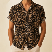 Man wearing a bold animal print party shirt - Dan Flashes