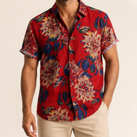 Man wearing a red retro floral Hawaiian shirt - Dan Flashes