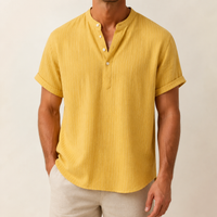 Man wearing a yellow band collar short sleeve shirt - Dan Flashes