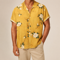 Man wearing a yellow floral shirt available in extended sizes - Dan Flashes