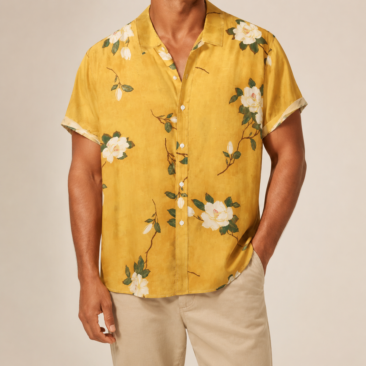 Man wearing a yellow floral shirt available in extended sizes - Dan Flashes