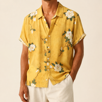 Man wearing a yellow floral resort shirt for a summer wedding - Dan Flashes