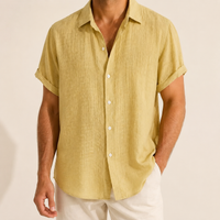 Man wearing a premium yellow beach and vacation shirt - Dan Flashes