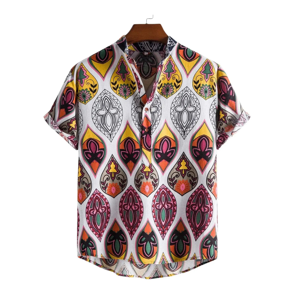 Light short-sleeve shirt with large red, yellow and dark teardrop ornaments