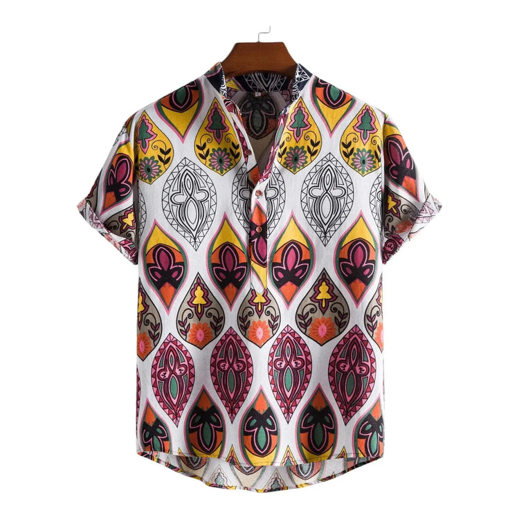 Light short-sleeve shirt with large red, yellow and dark teardrop ornaments