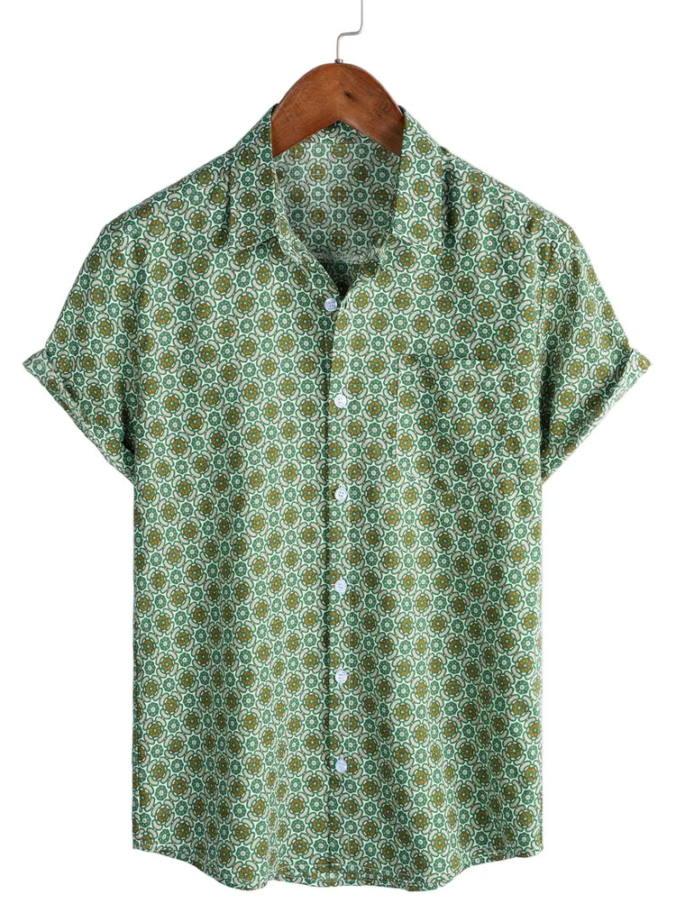 Green short-sleeve shirt with small repeating rounded floral motifs