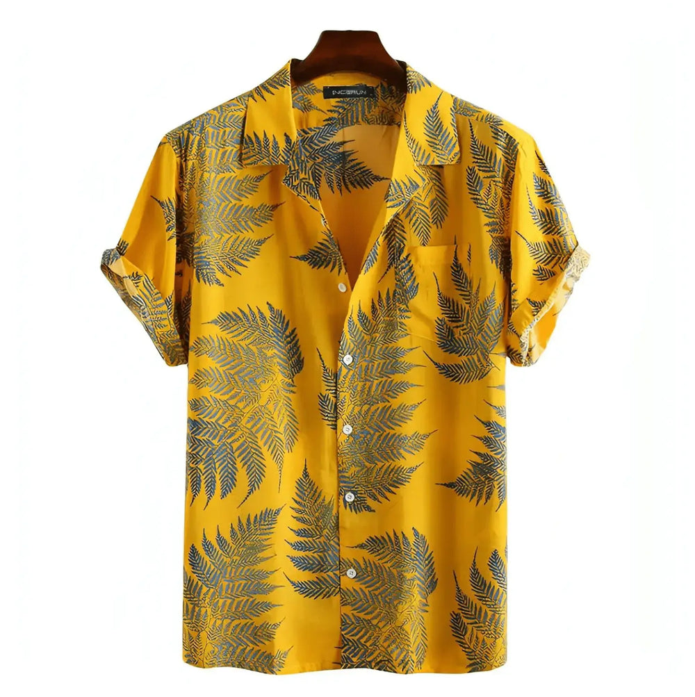 Yellow Hawaiian shirt with dark palm and leafy silhouettes