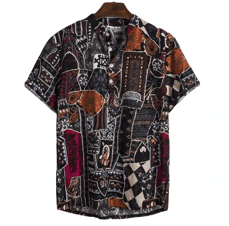 Dark short-sleeve shirt with outlined abstract shapes, checks and rust accents
