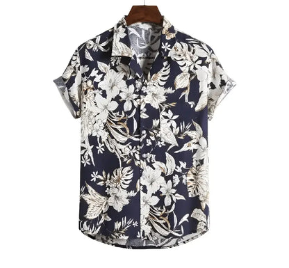 Dark Hawaiian shirt with dense pale botanical leaves and flowers