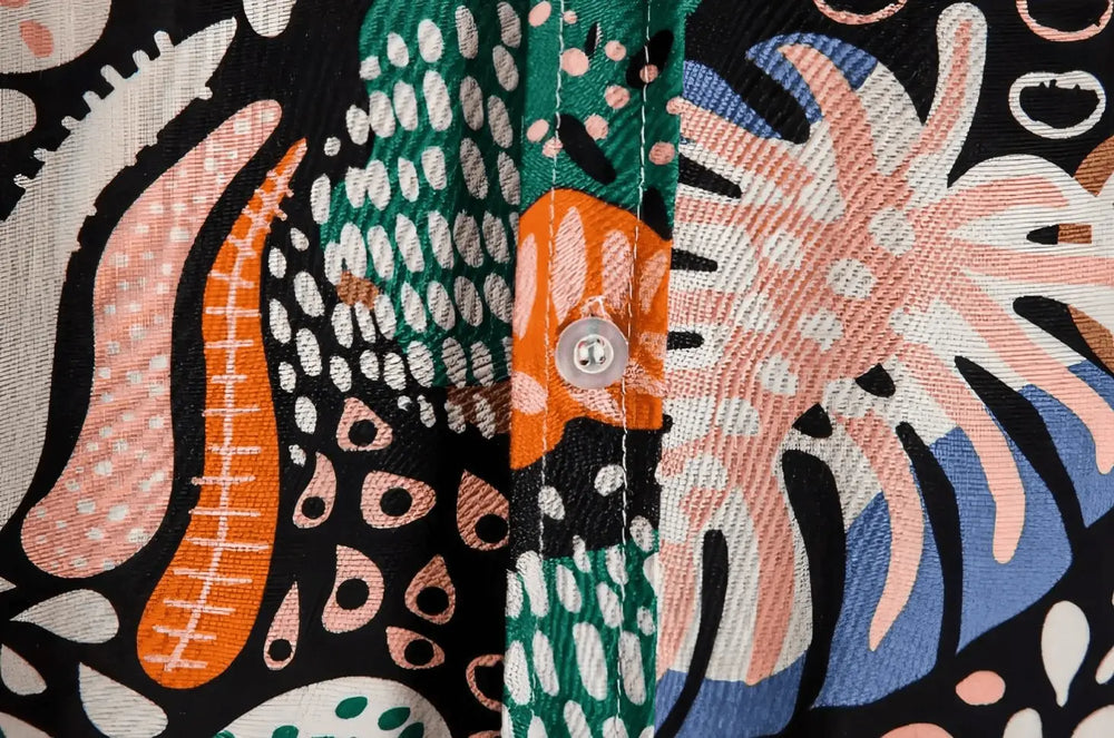 Abstract Leaf Print Beach Shirt, button-front and pattern detail