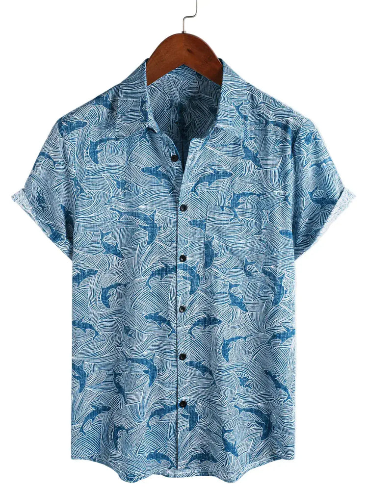 Blue short-sleeve button-up shirt with shark silhouettes and fine background lines