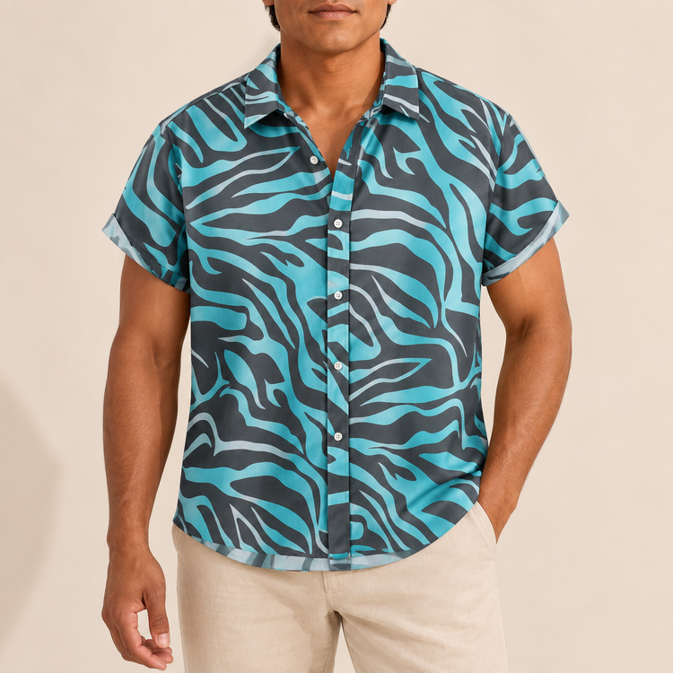 Model wearing dark short-sleeve shirt with aqua zebra-style stripes