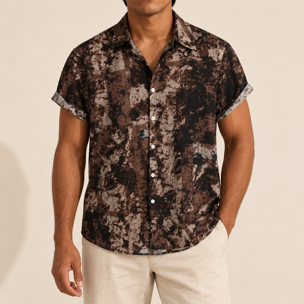 Model wearing a brown and black mottled short-sleeve shirt