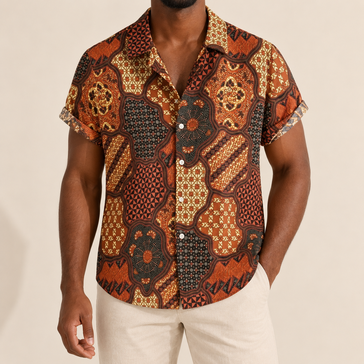 Model wearing a rust and brown medallion-print short-sleeve shirt
