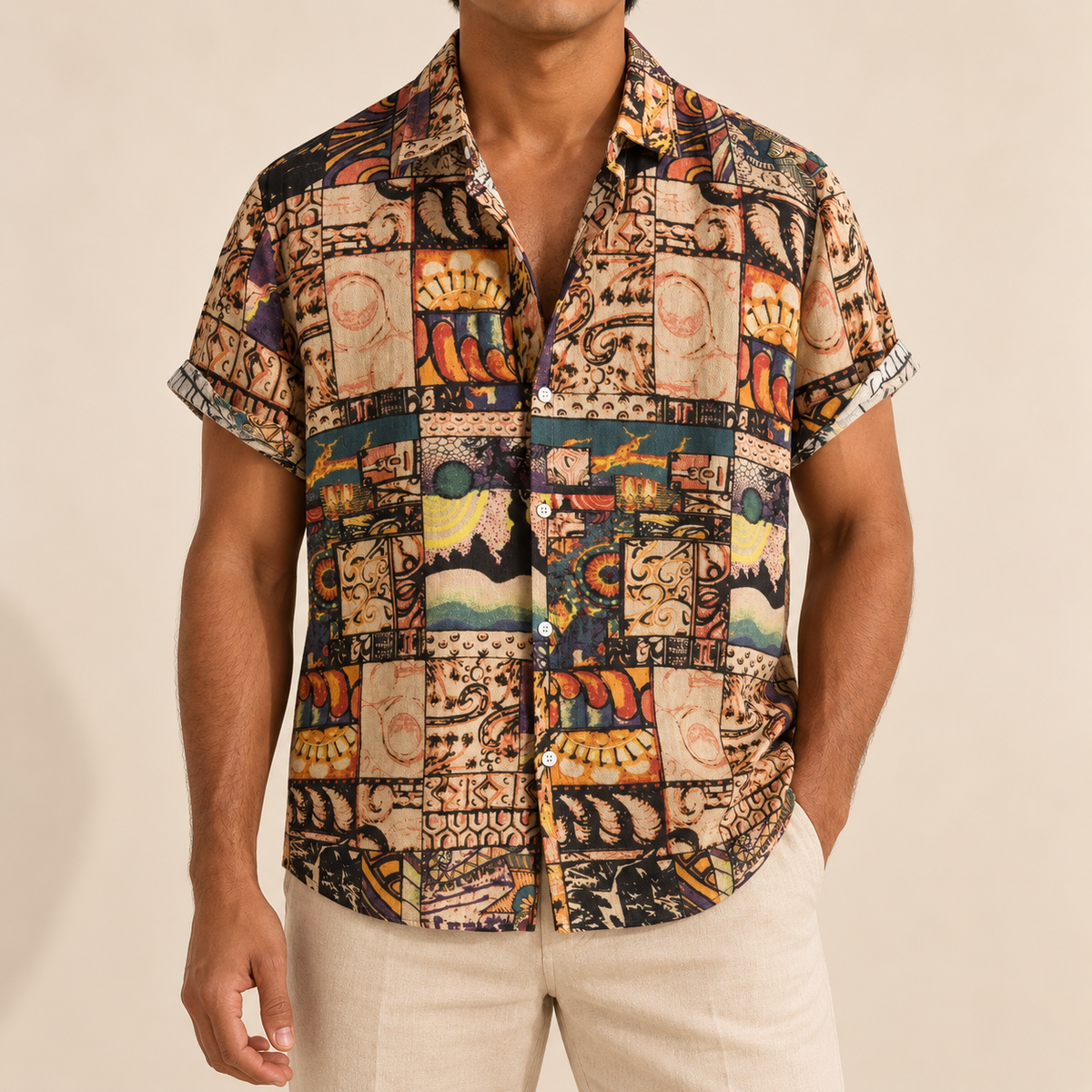 Model wearing a earth-tone patchwork short-sleeve shirt