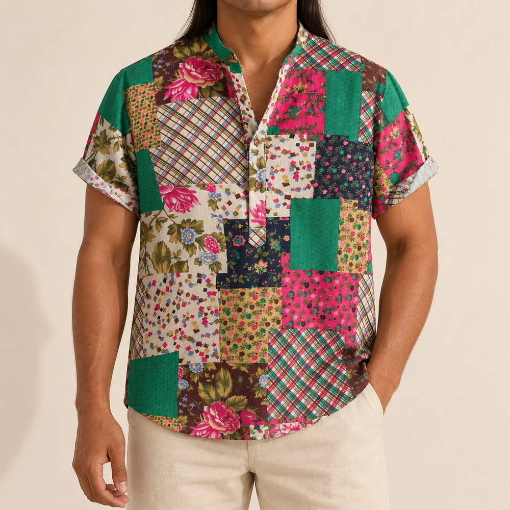 Model wearing a green and pink floral patchwork shirt with a band collar