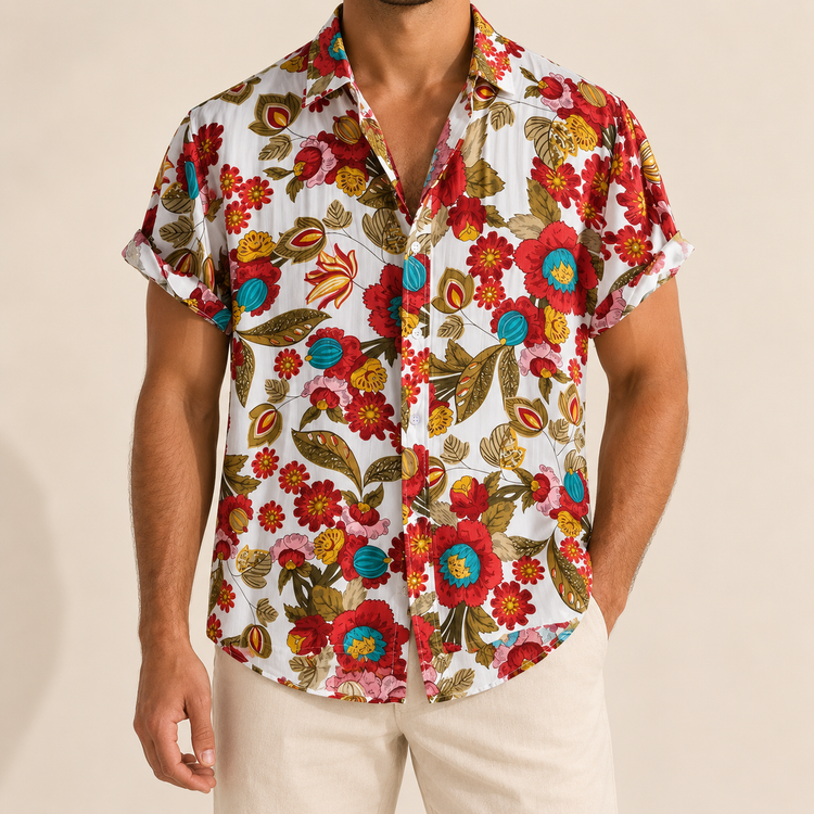Model wearing a light short-sleeve shirt with multicolored flowers and curling stems