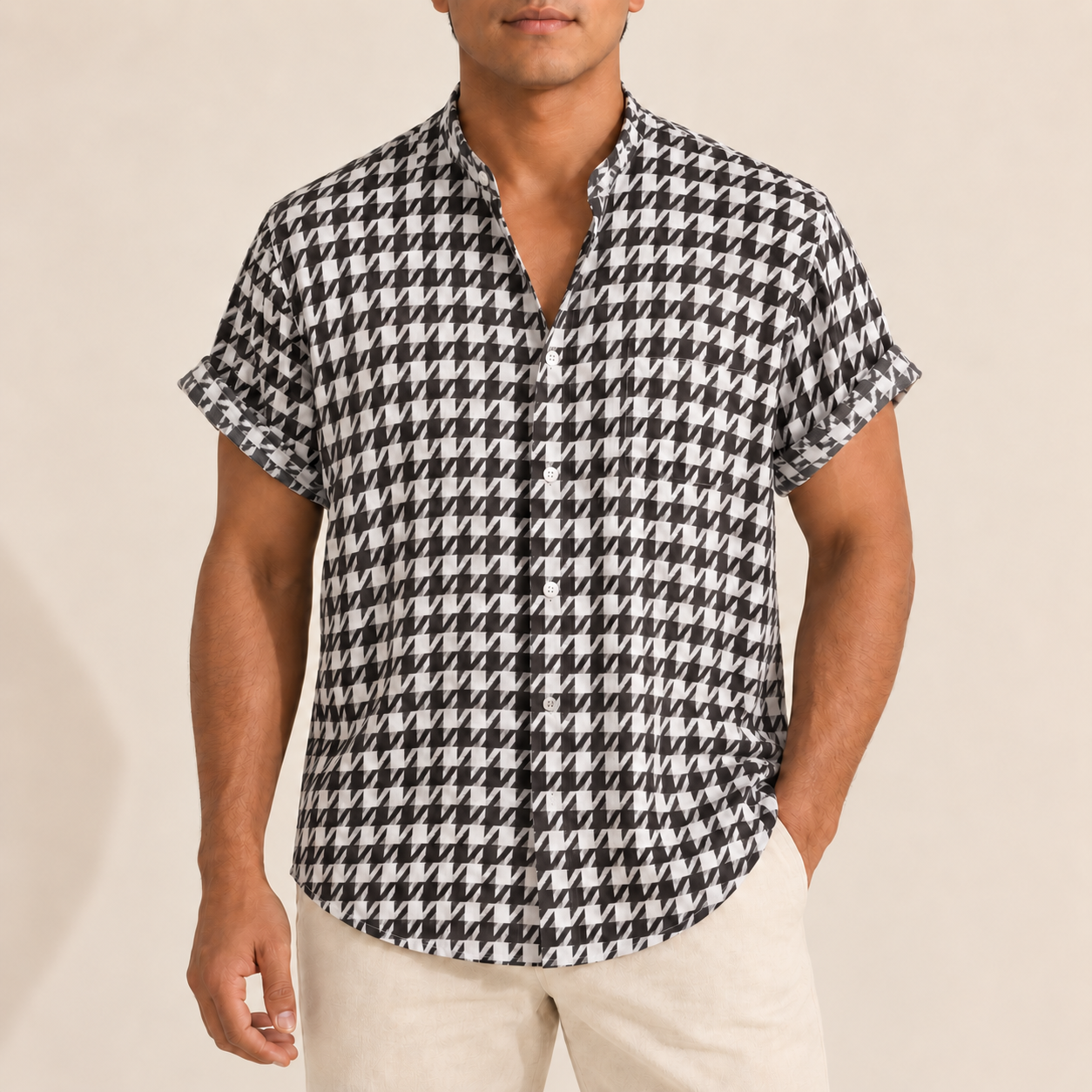Model wearing a black and white houndstooth band-collar shirt
