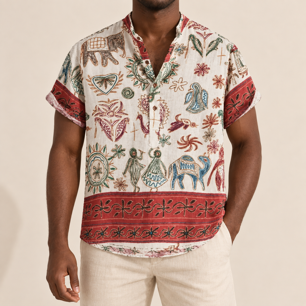 Model wearing an ivory illustrated-pattern shirt with red sleeve and hem borders